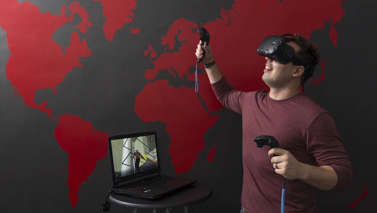 A Jincom team member testing a VR safety-training experience in the Cape Town studio